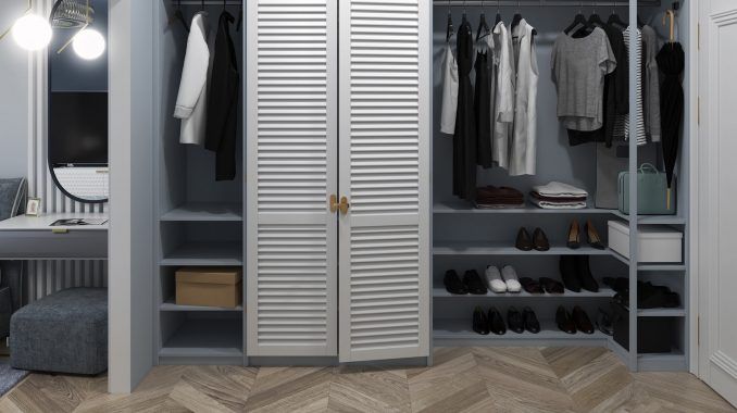 Vestidor gris en una habitación. Armario a medida.